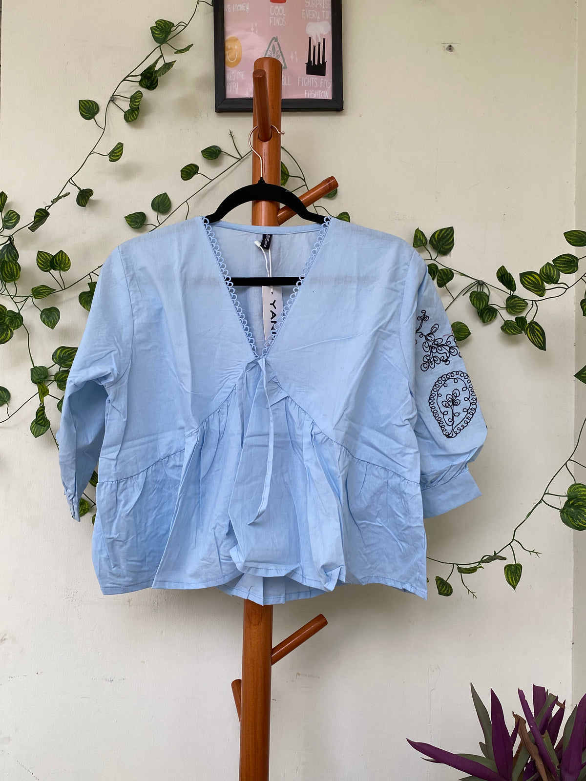 Light Blue Embroidered Peplum Top